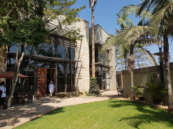 The Lion’s Den Restaurant Poster